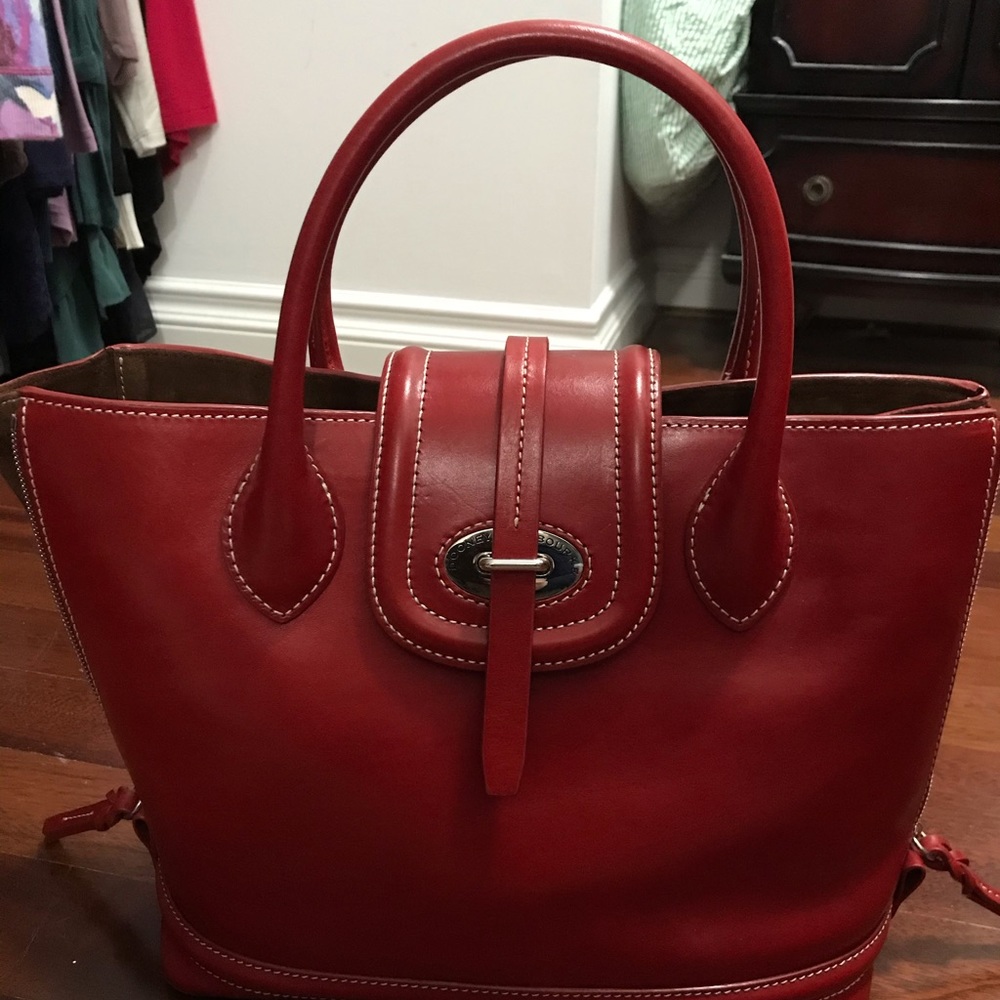 Beautiful red leather Dooney & Bourke purse.